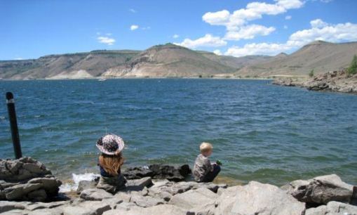Children fishing at Blue Mesa Reservoir in Colorado