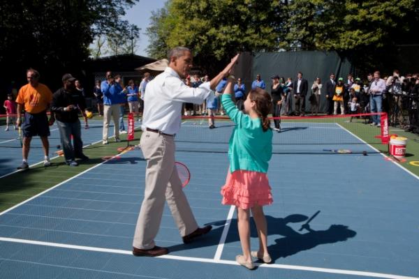 President Barack Obama High Fives His Doubles Partner