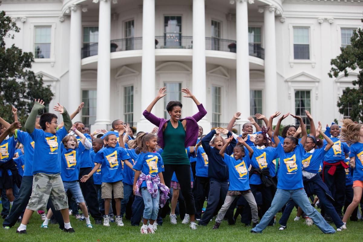 First Lady Michelle Obama leads Jumping Jacks