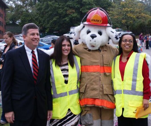 Deputy Secretary Porcari with PBES Principal Rachel Dubois, Montgomery County Fire Department's Sparky, and Assistant Principal Orinda Nelson