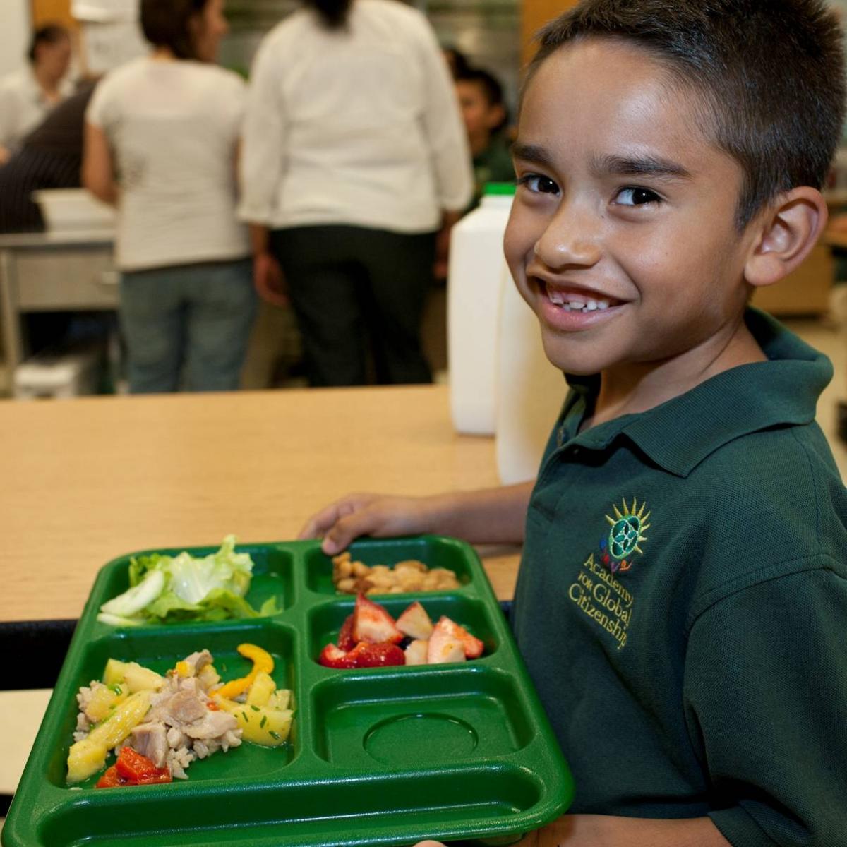 An Academy for Global Citizenship student in Chicago, Illinois enjoys a healthy meal. At AGC, students enjoy healthy international dishes like veggie Pozole, French crepes, Chinese orange chicken and Greek soup.