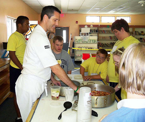 Chef Jamie McFadden and Special Needs students at Morning Star School in Orlando, Fla., make fresh apple sauce as part of the Chefs Move to School initiative.